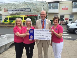 Harts Lions Presenting a checque to The Prostate Fund