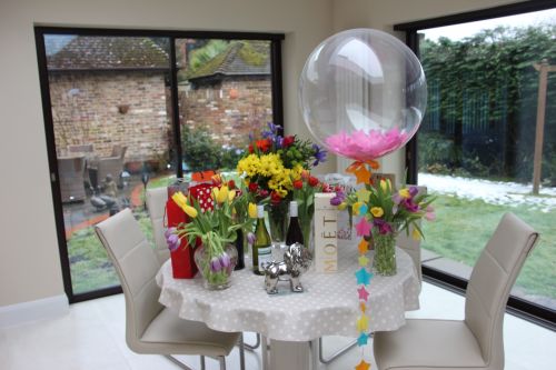 Beautiful table set with sanwhiches and balloons